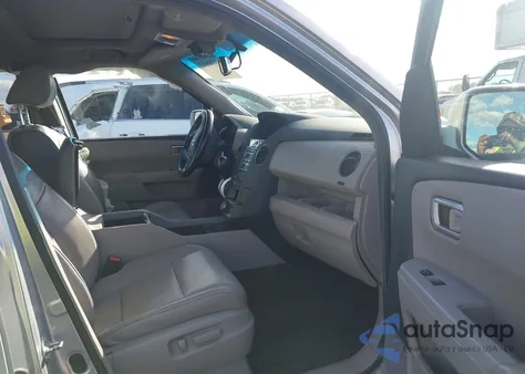 2011 Honda Pilot Touring z USA, uszkodzony, nr VIN 5FNYF4H97BB096791